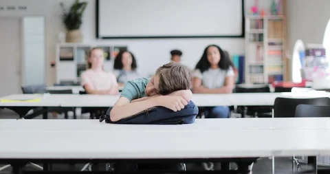 Student asleep in class Stock Footage 116658887