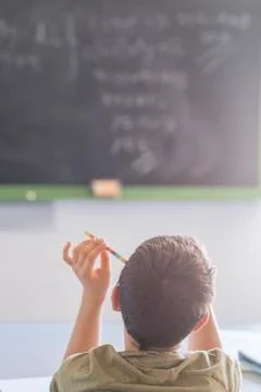Student attending in a  classroom during a lesson Stock Photos