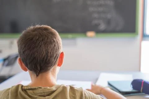 Student attending in a  classroom during a lesson Stock Photos