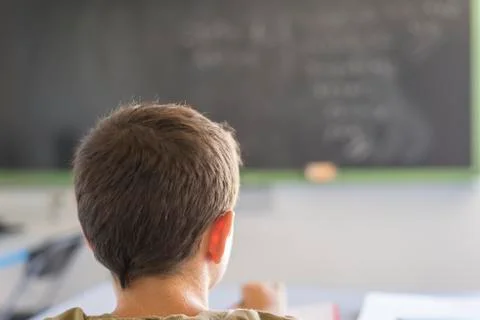 Student attending in a  classroom during a lesson Foto stock