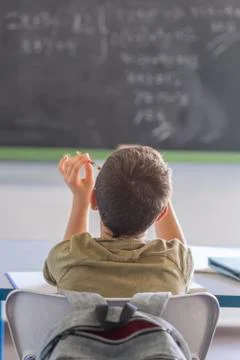 Student attending in a  classroom during a lesson Stock Photos