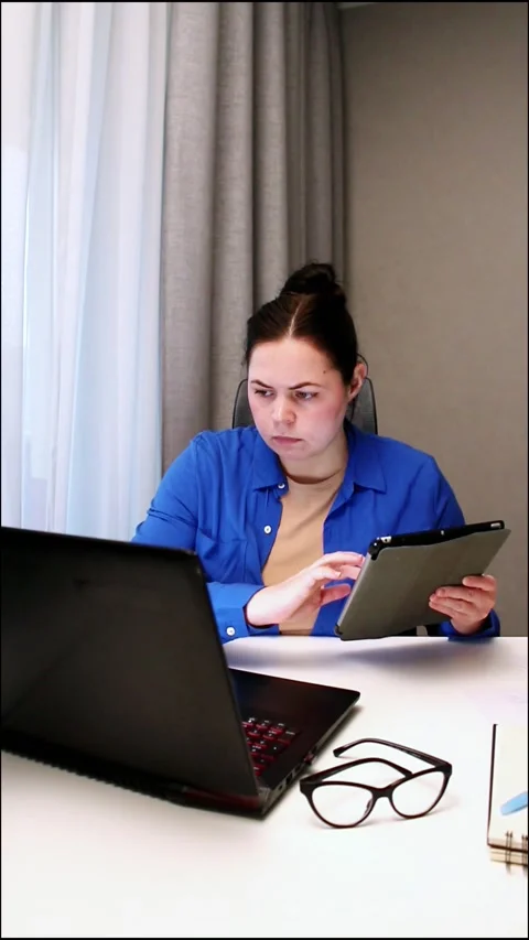 Student attending virtual university class via video conference. Young woman Видео 327010045