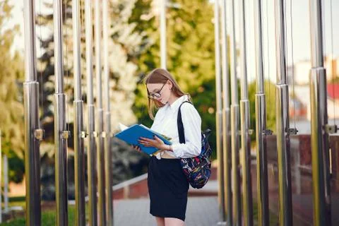 Student with a backpack on a school yard Stock Photos
