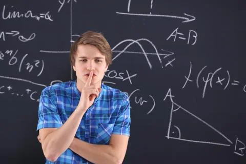 A student at the blackboard  Stock Photos