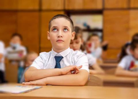Student boy doing test at the elementary school during the lesson Foto stock