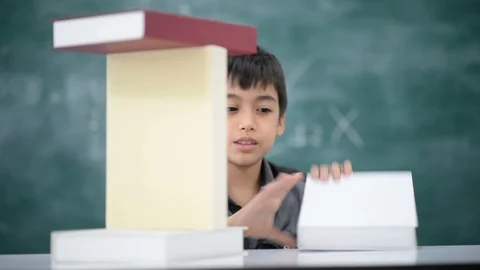 Student boy study hard with a lot of books Stockbeeldmateriaal 105273132