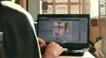 Student boy writing and chatting on Facebook HD Footage