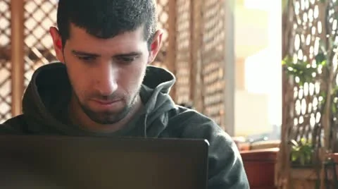Student boy writing and chatting on notebook Stock Footage 10901245