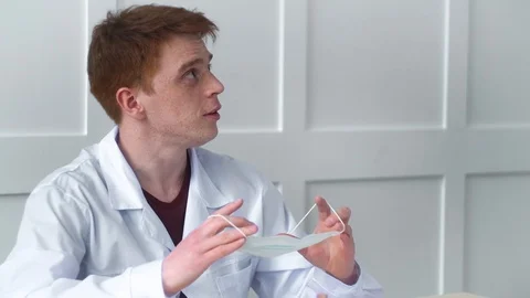 Student can argue about purpose of masks for protection against viral diseases Stock Footage 127015740