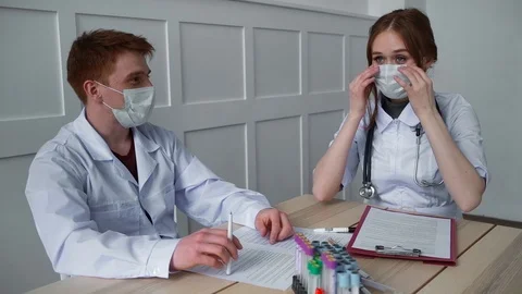 Student can argue about purpose of masks for protection against viral diseases Stock Footage 127513588