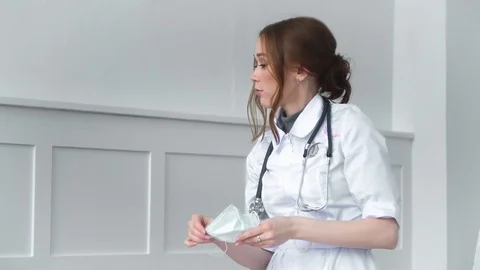Student can argue about purpose of masks for protection against viral diseases Stock Footage 127513806