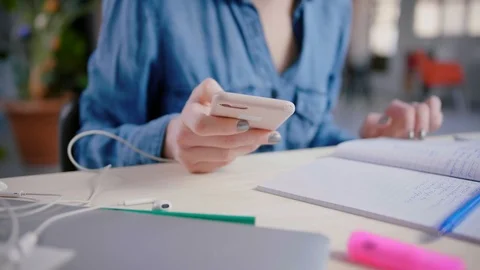 Student can't concentrate on homework preparation to exams with mobile around Stock Footage 103285269