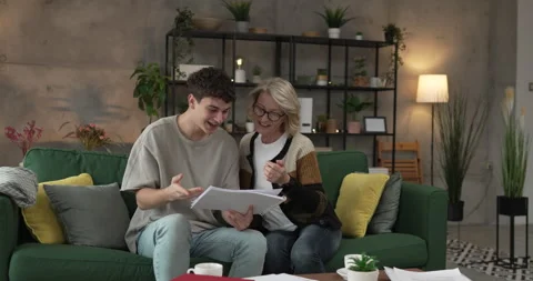 Student caucasian man study with help of his tutor professor or mother Stock Footage 267485933