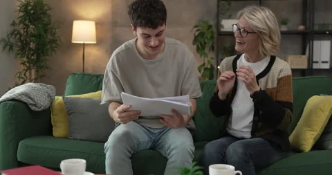 Student caucasian man study with help of his tutor professor or mother Stock Footage 267486002