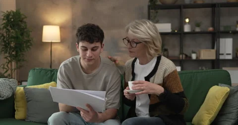 Student caucasian man study with help of his tutor professor or mother Video stock 267486144