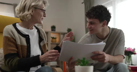 Student caucasian man study with help of his tutor professor or mother Stock Footage 267486901
