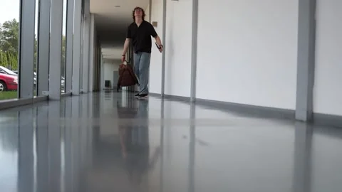 Student celebrates end of classes with backpack Stock Footage 338277572
