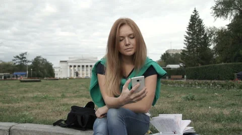 Student chatting by phone Stock Footage 67308250