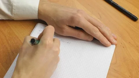 Student Cheating From Hand at Mathematics Examination Stock Footage 83168056