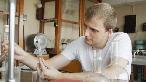 Student chemist do work and experiments during a college lecture. Close up po Stock-Footage 113347884