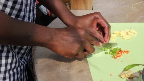 Student chops a Chilli Stock Footage 104142079