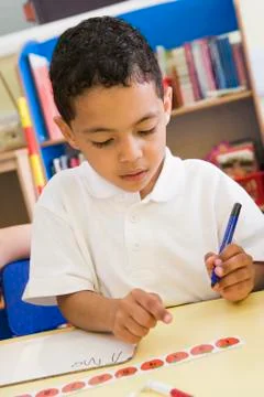 Student in class learning numbers (selective focus) Stock Photos