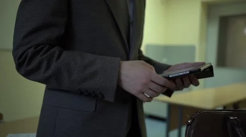 Student in costume using his digital tablet in a class before lesson Stock Footage 68549462