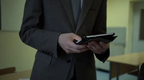 Student in costume using his digital tablet in a class before lesson Stock Footage 68549489