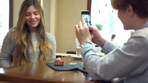 Student couple chatting together in a cafe Stock Footage 70567337