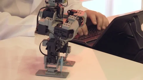 The student creates a robot in the laboratory Stock Footage 77264310