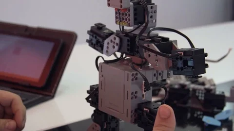 The student creates a robot in the laboratory Stock Footage 77267734