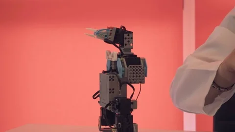 The student creates a robot in the laboratory Stock Footage 77416830