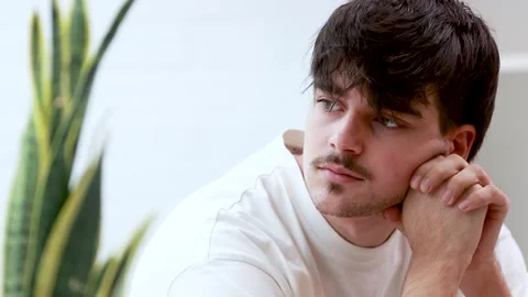 Student at desk with computer thinking Stock Footage 255706919