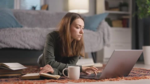 Student Distracted from Studying Stock Footage 252704192