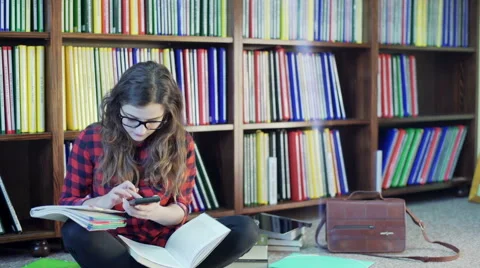 Student doing homework on maths and calculate something Stock Footage 59992848