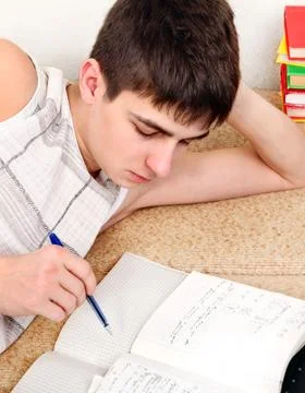 Student doing Homework Stock-Fotos