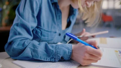 Student doing homework preparation to exams using mobile phone Technology help Stock Footage 103290874
