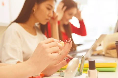 Student doing manicure Stock Photos