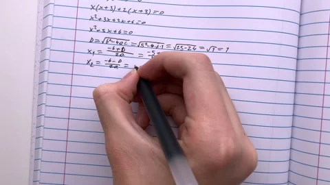 A student doing math in a notebook. Stock Footage 289141861
