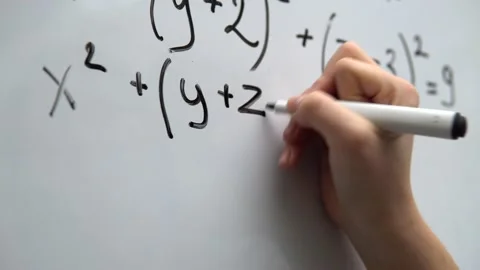 Student doing mathematic exercises on whiteboard, writing math equation close up Stock Footage 145375463