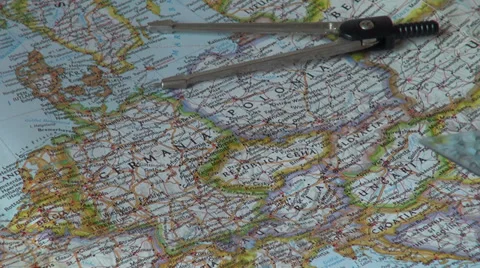 Student doing measurements on map for geography class with compass Stock Footage 31211068