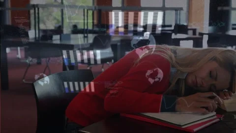 Student dozing, head settling and pen closing, bar charts growing across sweater Stock Footage 321100007