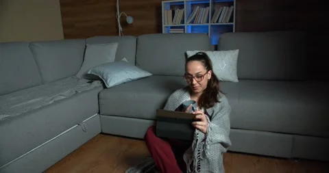 Student drinking coffee and using tablet. Online education concept. Stock Footage 130328254