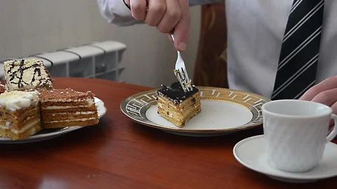 Student drinks coffee Stock Footage 169784894