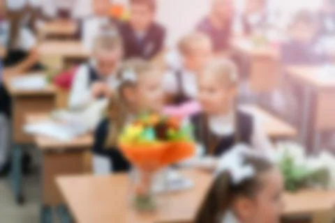 Student of elementary school in uniform in classroom. Foto stock