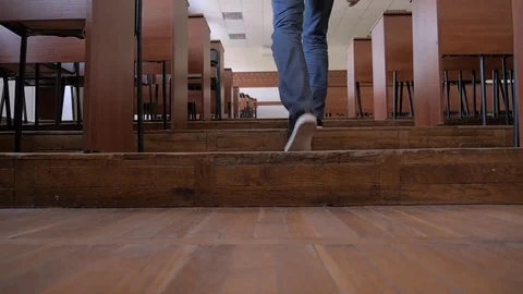 Student entering the lecture hall before lecture Stock Footage 77586724