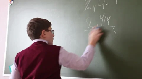 Student erases the blackboard Video stock 58867015