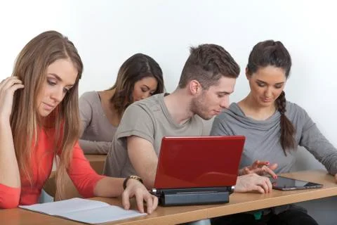 Student explains something on her tablet pc Stock-Fotos