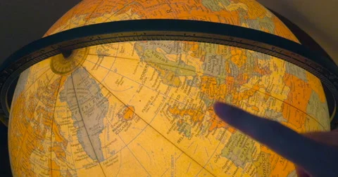 Student Explores Retro Globe Discovering World History Stock Footage 65527564