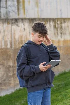 Student feeling stressed using digital tablet learning Stock Photos